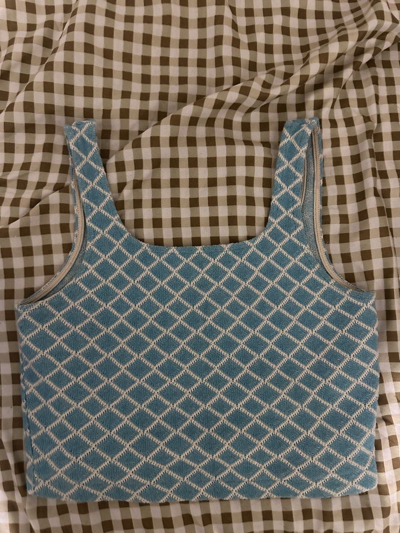 Zara Blue Diamond Knit Tank Top (Category: Sleeveless) located in Quezon City. Submitted by kittytangco (Listing ID 1447275475, Image 1). Description: - Cute blue and white diamond knit tank top - Brand: Zara - Neckline: Square - Straps: Thick - Style: Casual, beach cover-up - Versatile: Pairs well with high-waisted bottoms.