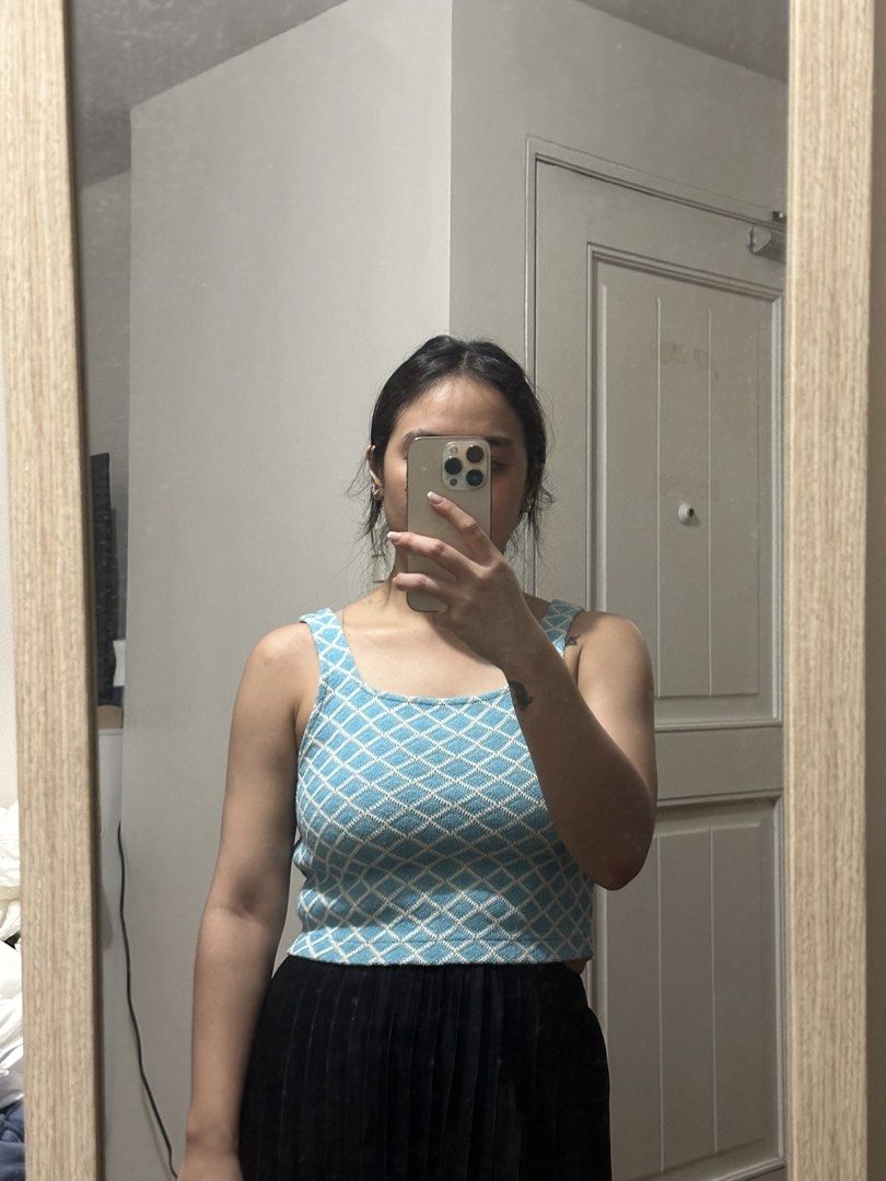 Zara Blue Diamond Knit Tank Top (Category: Sleeveless) located in Quezon City. Submitted by kittytangco (Listing ID 1447275475, Image 2). Description: - Cute blue and white diamond knit tank top - Brand: Zara - Neckline: Square - Straps: Thick - Style: Casual, beach cover-up - Versatile: Pairs well with high-waisted bottoms.