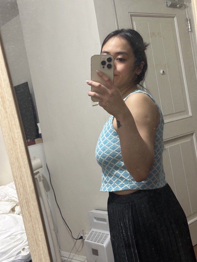 Zara Blue Diamond Knit Tank Top (Category: Sleeveless) located in Quezon City. Submitted by kittytangco (Listing ID 1447275475, Image 3). Description: - Cute blue and white diamond knit tank top - Brand: Zara - Neckline: Square - Straps: Thick - Style: Casual, beach cover-up - Versatile: Pairs well with high-waisted bottoms.