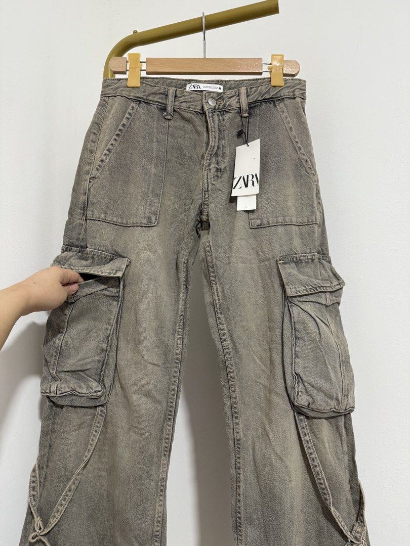 ZARA Wide Leg Cargo Jeans Pants (Category: Jeans) located in Antipolo. Submitted by jackiestash2 (Listing ID 1447288067, Image 3). Description: - Zara Grey Wash Wide Leg Cargo Jeans - Brand New with Tags Attached - Multiple Pockets for Functionality - Adjustable Tie Details at Hem - Relaxed Fit for Ultimate Comfort - Perfect for Casual Everyday Outfits Length:41.5 Antipolo Gcash/BDO J&T/Lalamove .
