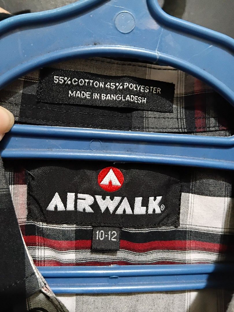 10-12Y Airwalk Plaid Polo (Category: Babies & Kids Fashion) located in Manila. Submitted by ramcyanthony (Listing ID 1450920907, Image 2). Description: - width 18in length 23in - Style: short sleeve button-up shirt - Pattern: Classic plaid (black, white, red) - Features: Two chest pockets - Size: 10-12 .