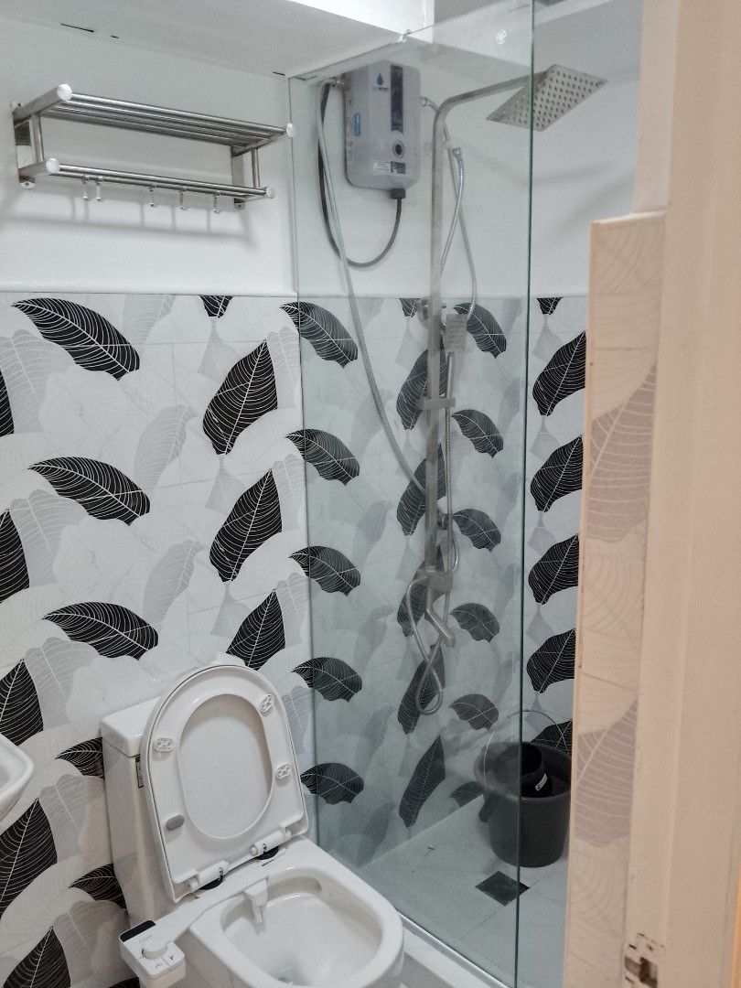 1BR condo unit Corinthian Executive Regency Condominium (Category: Apartments & Condos) located in Manila. Submitted by batchi1019 (Listing ID 1450824738, Image 2). Description: Newly renovated condo unit Features a sleek kitchen with modern appliances and a stylish backsplash. The bathroom is updated with a glass-enclosed shower and a rainfall showerhead. Spacious living area with a decorative ceiling light. Located in a convenient area. Ready f