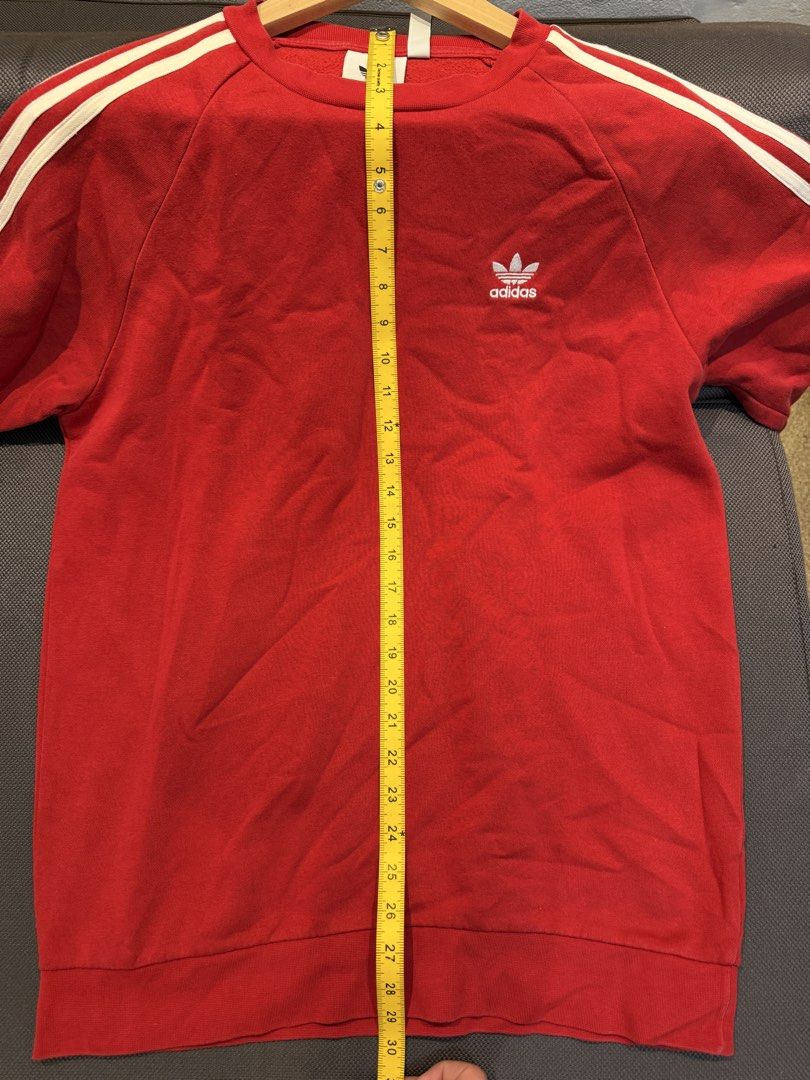 Adidas 3-Stripes Crew Sweatshirt Red Size L (Category: Coats, Jackets and Outerwear) located in Bulacan. Submitted by surewinstuff (Listing ID 1450918210, Image 2). Description: - Classic red Adidas sweatshirt - Iconic 3-stripes on sleeves - Embroidered trefoil logo on chest - Made in Pakistan - Tagged size L - check photo for measurements.