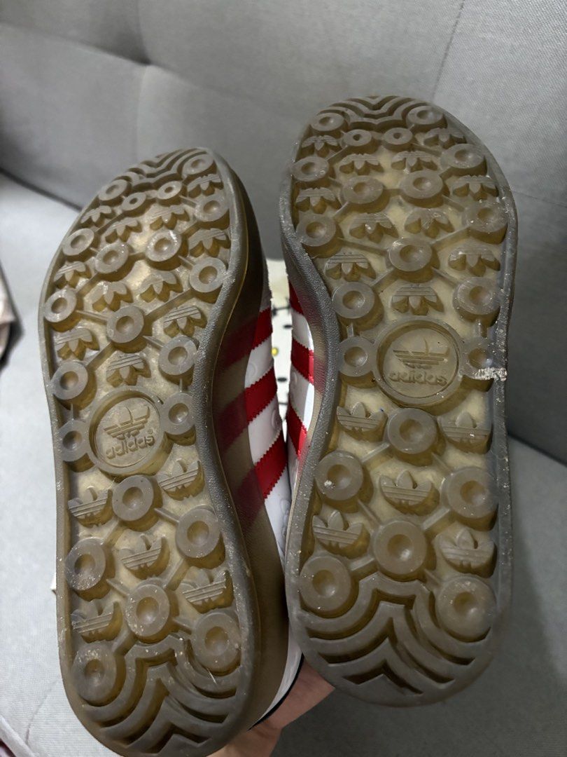 Adidas Gazelle Hello Kitty Sneakers (Category: Sneakers) located in Mandaluyong City. Submitted by mclldmrl (Listing ID 1450882445, Image 2). Description: - Adidas Gazelle x Kitty Collaboration - Color: White with Red Stripes - Material: Grey Suede - Features: Kitty graphics on heel and tongue - Size: UK 7 - Includes: Original box.
