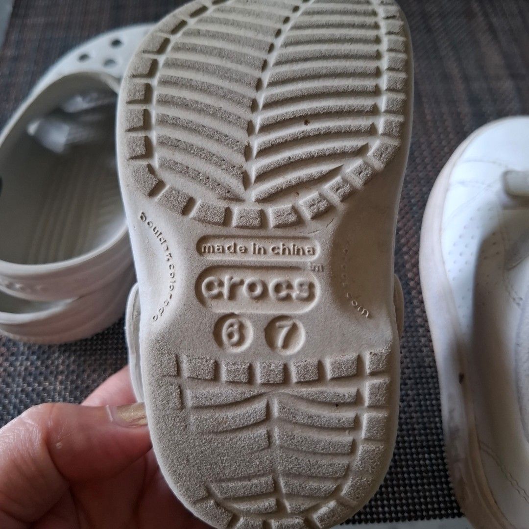 Adidas Neo & Crocs Kids Shoes Bundle (Category: Babies & Kids Fashion) located in Don Carlos. Submitted by PphiXi_Finds (Listing ID 1450870007, Image 3). Description: - Bundle includes 2 pairs of kids' shoes. - White Adidas Neo sneakers: Size UK 7K / US 7.5K / FR 25 / JP 145. - Beige Crocs clogs: Size C7. - Both are ideal for everyday wear. - Selling as a set..