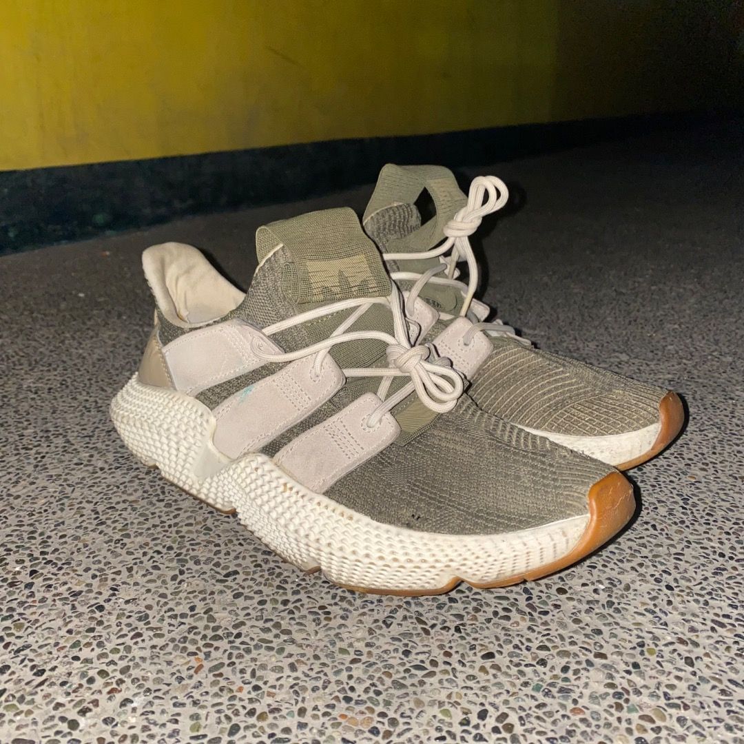 Adidas Prophere Olive Green size 9.5 (Category: Sneakers) located in Manila. Submitted by johnpm (Listing ID 1450736725, Image 3). Description: - Adidas Prophere Sneakers - Color: Olive Green - Size: 9.5 US Men's - Features: Unique textured sole, knit upper, lace-up closure - Perfect for: Casual wear - Reason for selling: No longer needed.