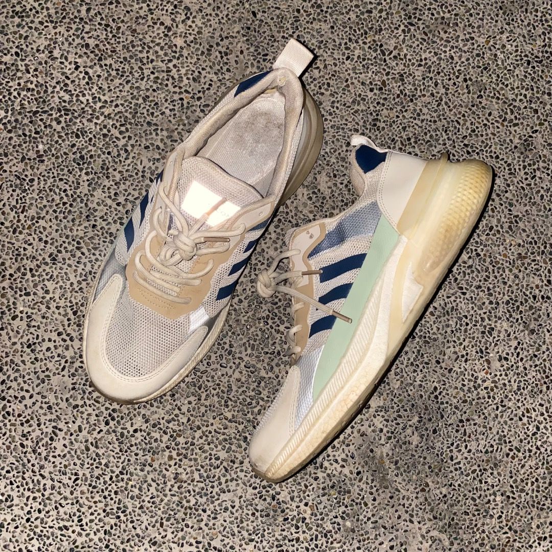 Adidas Sneakers size 9 (Category: Sneakers) located in Manila. Submitted by johnpm (Listing ID 1450736894, Image 3). Description: - Adidas sneakers in a classic white and blue colorway. - Features a breathable mesh upper with durable synthetic overlays. - Stylish chunky translucent sole for a modern look. - Laces show some wear, but are fully functional. - Soles have minor scuffs, but plenty of tread remaining. - Great value, still lots of wear l