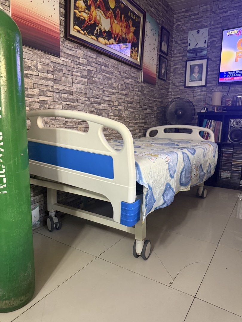 Adjustable Hospital Bed with Wheels and Mattress (Category: Medical Supplies & Tools) located in Antipolo. Submitted by yanniten (Listing ID 1450934776, Image 1). Description: - Adjustable hospital bed - Includes comfortable mattress with cute teddy bear & heart pattern - Equipped with wheels for easy mobility - Sturdy construction for home care needs - Ready for its new home.