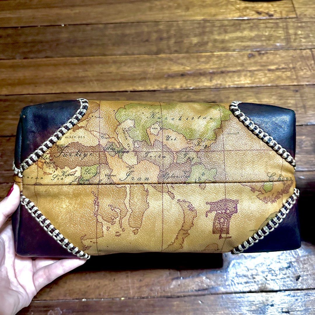 Alviero Martini 1 Classe Map Print Leather Handbag (Category: Luxury Bags & Wallets) located in Cebu City. Submitted by itsskymisty (Listing ID 1450893355, Image 3). Description: - Authentic Alviero Martini 1 Classe handbag - Iconic Geo map print - Made in Italy - Genuine leather trim and handles Small size Normal signs of usage since preloved.