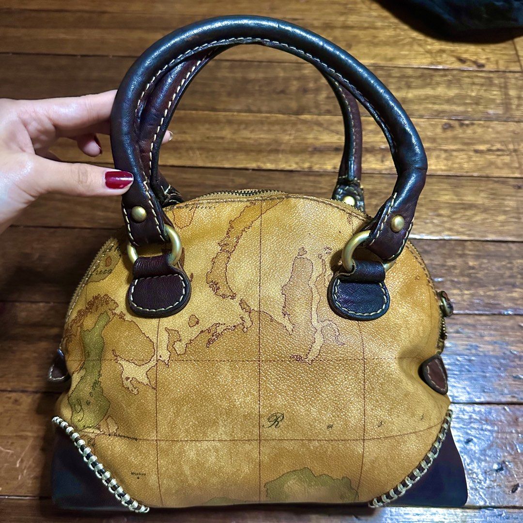 Alviero Martini 1 Classe Map Print Leather Handbag (Category: Luxury Bags & Wallets) located in Cebu City. Submitted by itsskymisty (Listing ID 1450893355, Image 2). Description: - Authentic Alviero Martini 1 Classe handbag - Iconic Geo map print - Made in Italy - Genuine leather trim and handles Small size Normal signs of usage since preloved.