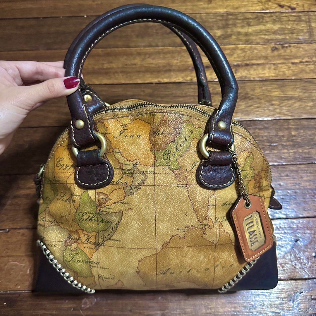 Alviero Martini 1 Classe Map Print Leather Handbag (Category: Luxury Bags & Wallets) located in Cebu City. Submitted by itsskymisty (Listing ID 1450893355, Image 1). Description: - Authentic Alviero Martini 1 Classe handbag - Iconic Geo map print - Made in Italy - Genuine leather trim and handles Small size Normal signs of usage since preloved.