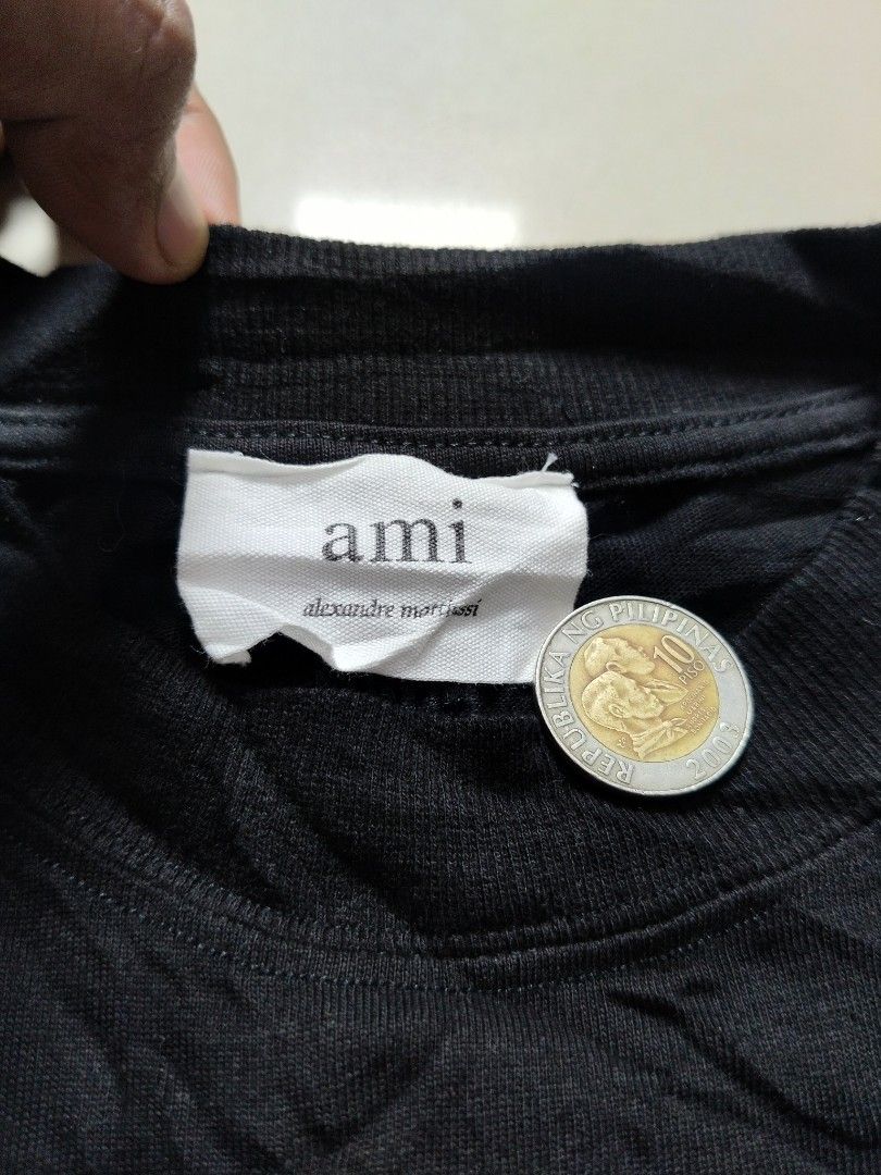 Ami Paris Black Tiger (Category: Luxury Apparel) located in Ilagan. Submitted by goodsanddeals-a73c28 (Listing ID 1450848884, Image 2). Description: Actual Dimes : 24 x 27 Color rate : 10/10 Almost brand new condition & No issue.