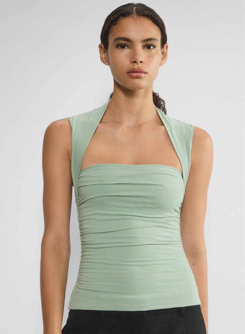 Aritzia Green Casual Flourish Top (Category: Others Tops) located in Muntinlupa City. Submitted by shopmycloset_33 (Listing ID 1450800843, Image 1). Description: Never worn!! Tags are just removed! Model in first photo is wearing a different color RULES All prices are final! No meetups No when worn No returns, No exchanges, No refund What you see is what you get. Happy Shopping 🫶🏻 MOP: GCASH / BPI Shipping: J&T .