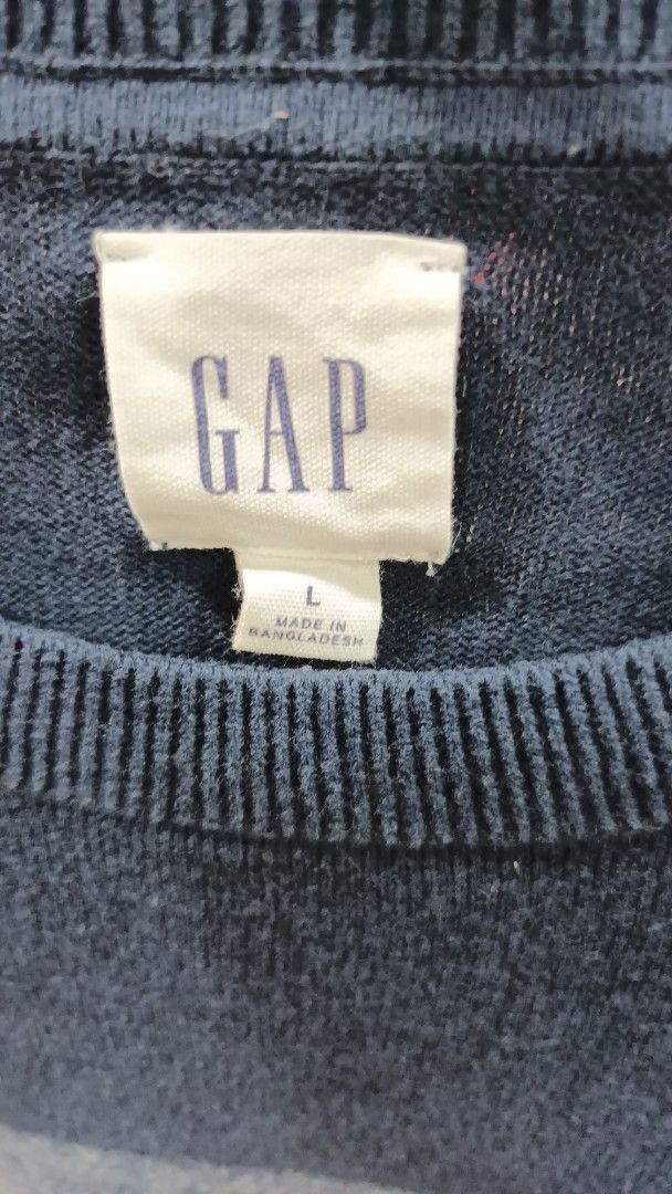 Authentic Gap Men's Crewneck Sweater (Category: Coats, Jackets and Outerwear) located in Quezon City. Submitted by ddgapstore (Listing ID 1450882163, Image 2). Description: - Navy blue crewneck sweater from GAP - Size: Large (L) - Design: Horizontal stripes in grey and lighter blue - Material: Comfortable knit - Versatile: Great for layering or wearing solo.