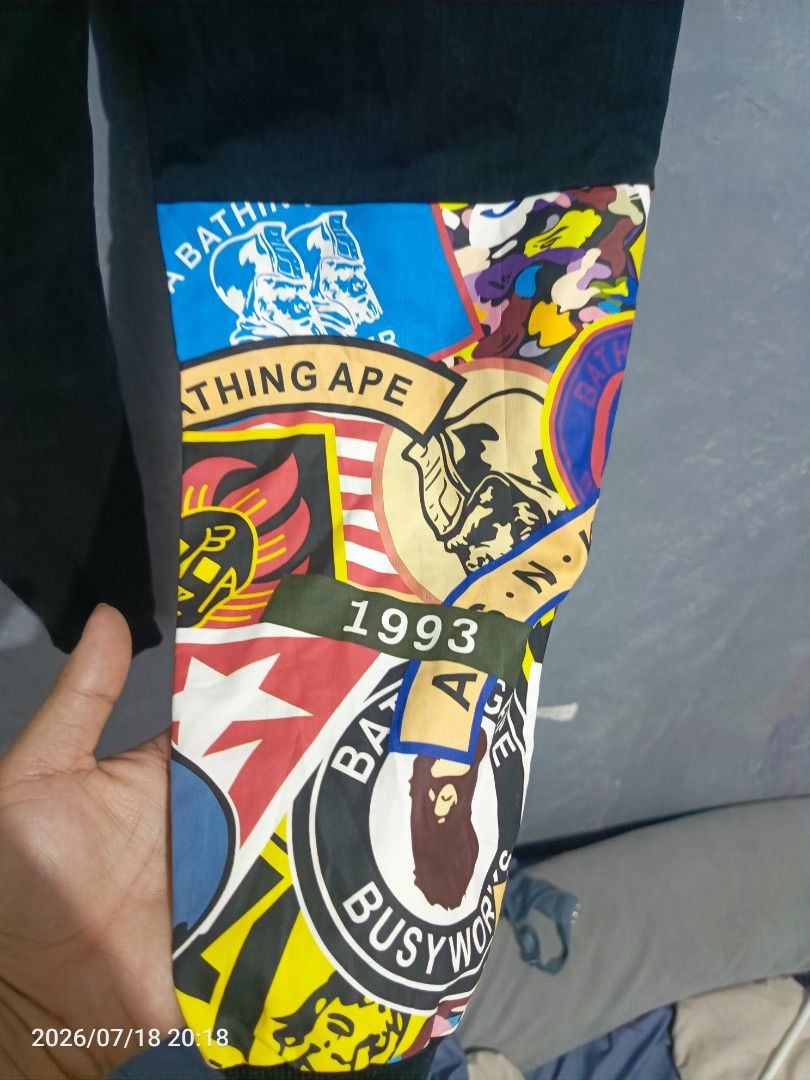 BAPE APE Busy Works Patchwork Jogger Pants (Category: Joggers) located in Iloilo. Submitted by wendxcz-thrift- (Listing ID 1450815700, Image 3). Description: OFF/LEGIT 🧐 - Brand: BAPE - Color: Black - Design: Iconic Busy Works patchwork on leg - Features: Elastic waistband with drawstring, ribbed cuffs - Style: Ideal for casual wear MOD: GCASH/BPI + SF.
