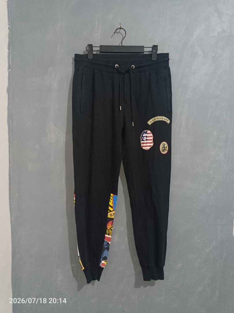 BAPE APE Busy Works Patchwork Jogger Pants (Category: Joggers) located in Iloilo. Submitted by wendxcz-thrift- (Listing ID 1450815700, Image 1). Description: OFF/LEGIT 🧐 - Brand: BAPE - Color: Black - Design: Iconic Busy Works patchwork on leg - Features: Elastic waistband with drawstring, ribbed cuffs - Style: Ideal for casual wear MOD: GCASH/BPI + SF.