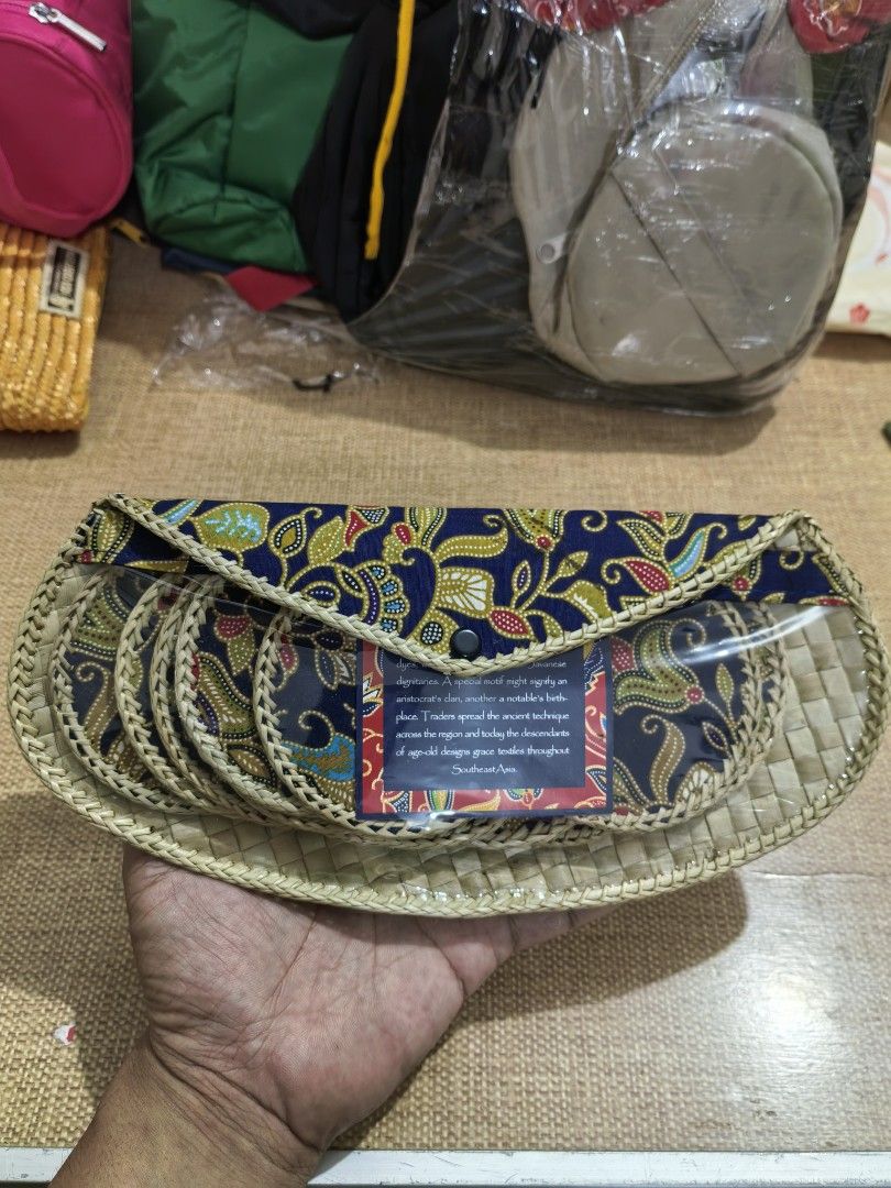 Batik Coaster Set 12 (Category: Other Kitchenware & Tableware) located in Cebu City. Submitted by dudes_villanueva (Listing ID 1450775515, Image 2). Description: Batik Coaster Set Brand New 12 Coasters inside. 📌 Features woven rattan construction with floral fabric tops and includes a matching envelope-style storage case. 📌 The set commonly contains 6 or 12 individual coasters, often sold as handmade souvenir items from Southeast Asia. 📌 The d