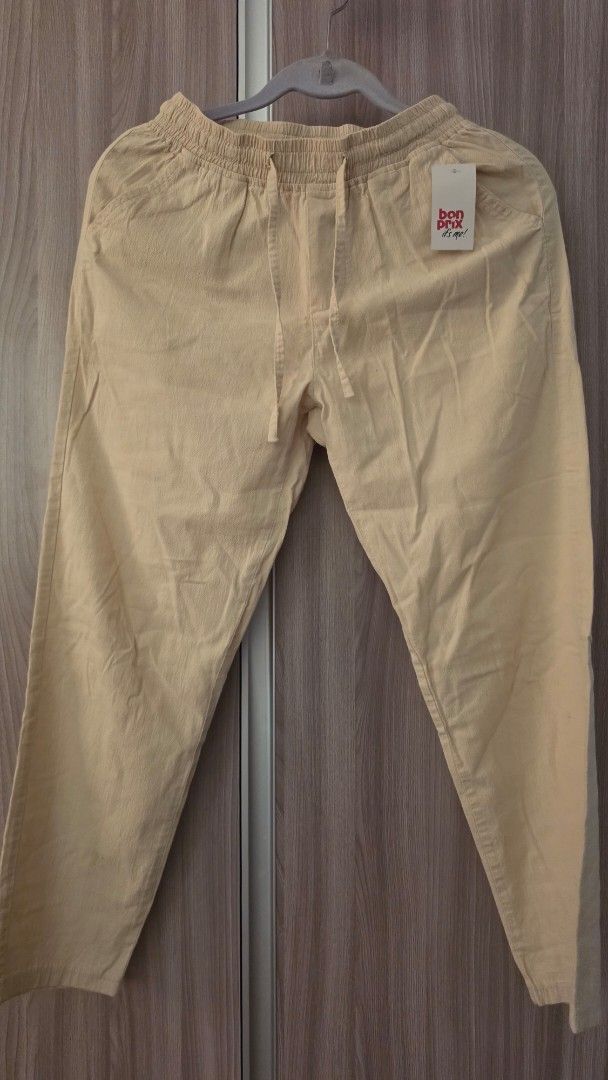 Beige Drawstring Pants with Tag (Category: Other Bottoms) located in Quezon City. Submitted by highonspotlight (Listing ID 1450869495, Image 1). Description: Beige pants with a drawstring waist. Still has the original tag attached. Great for casual wear..