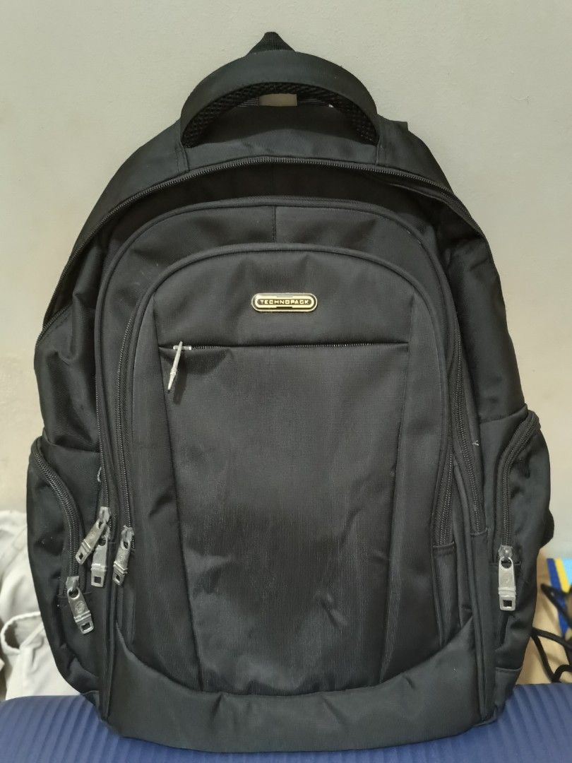 Black Backpack with Multiple Compartments (Category: Backpacks) located in Cebu City. Submitted by rrwho (Listing ID 1450803176, Image 1). Description: - Technopack Backpack w/ Laptop Compartment for P700. Issue: 1 Zipper Lock Handle.