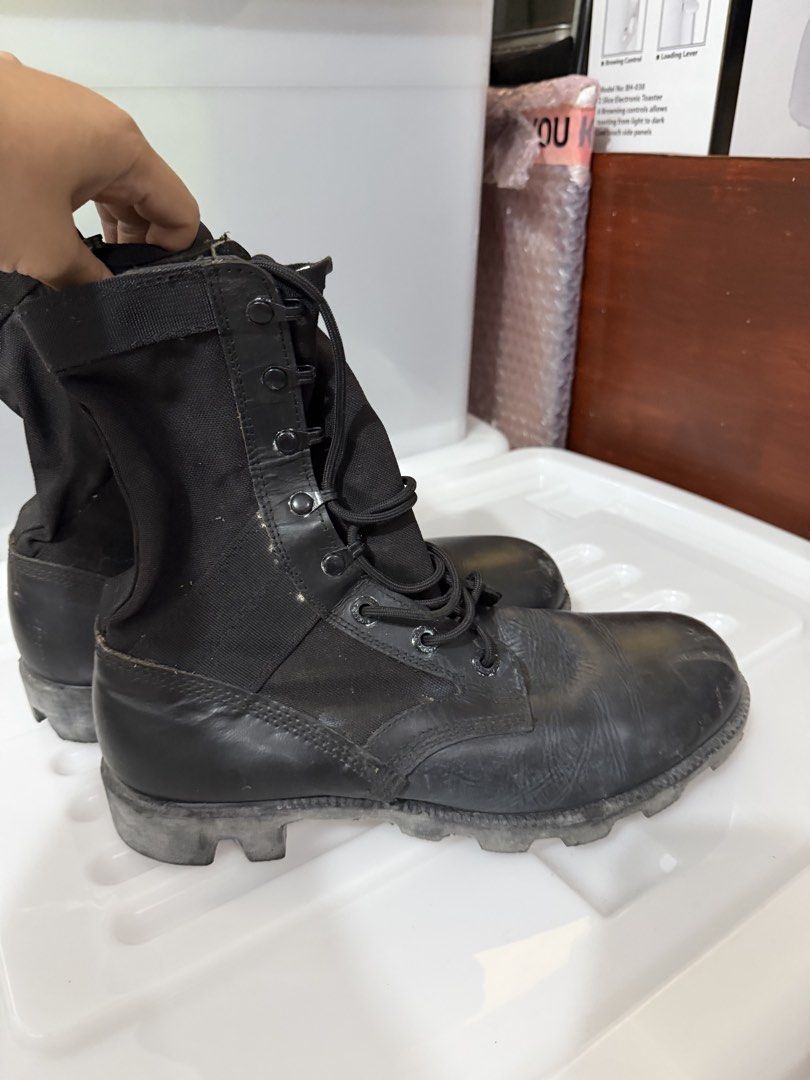 Black Combat Boots (Category: Boots) located in Quezon City. Submitted by circeaiaia (Listing ID 1450766290, Image 3). Description: - Black combat boots - Lace-up front - High ankle support - Durable sole - Ideal for outdoor activities or work - Shows some scuffs and dirt from use - Ready for a new owner.