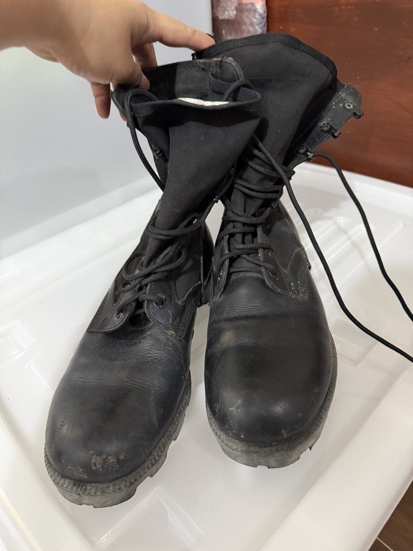 Black Combat Boots (Category: Boots) located in Quezon City. Submitted by circeaiaia (Listing ID 1450766290, Image 1). Description: - Black combat boots - Lace-up front - High ankle support - Durable sole - Ideal for outdoor activities or work - Shows some scuffs and dirt from use - Ready for a new owner.