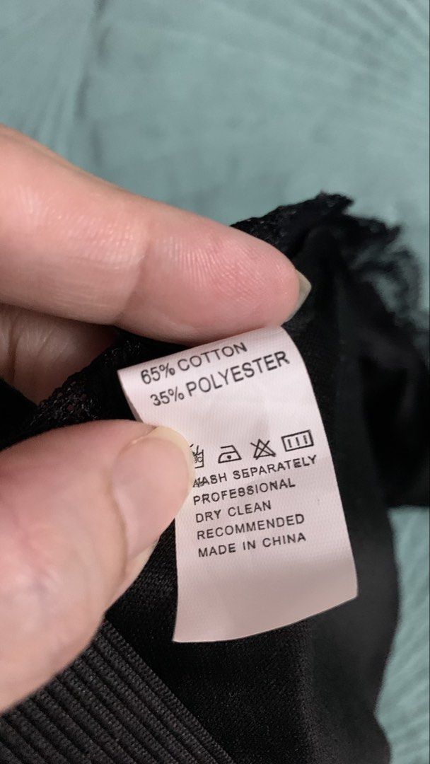 Black Lace Bralette with Adjustable Band (Category: New Undergarments & Loungewear) located in Kuala Lumpur. Submitted by xtraordinary1818 (Listing ID 1450850652, Image 3). Description: - Chic black lace bralette - Features a stylish halter neck strap - Wide, adjustable band with hook and eye closure for a perfect fit - Comfortable blend of 65% cotton and 35% polyester - Care: Wash separately, professional dry clean recommended - Made in China.