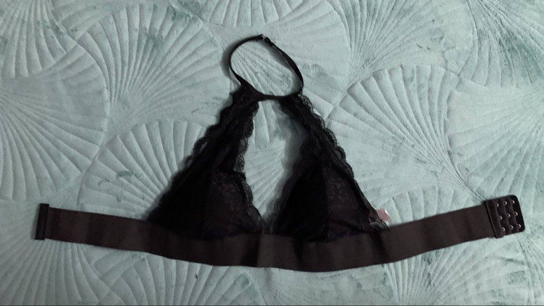 Black Lace Bralette with Adjustable Band (Category: New Undergarments & Loungewear) located in Kuala Lumpur. Submitted by xtraordinary1818 (Listing ID 1450850652, Image 1). Description: - Chic black lace bralette - Features a stylish halter neck strap - Wide, adjustable band with hook and eye closure for a perfect fit - Comfortable blend of 65% cotton and 35% polyester - Care: Wash separately, professional dry clean recommended - Made in China.