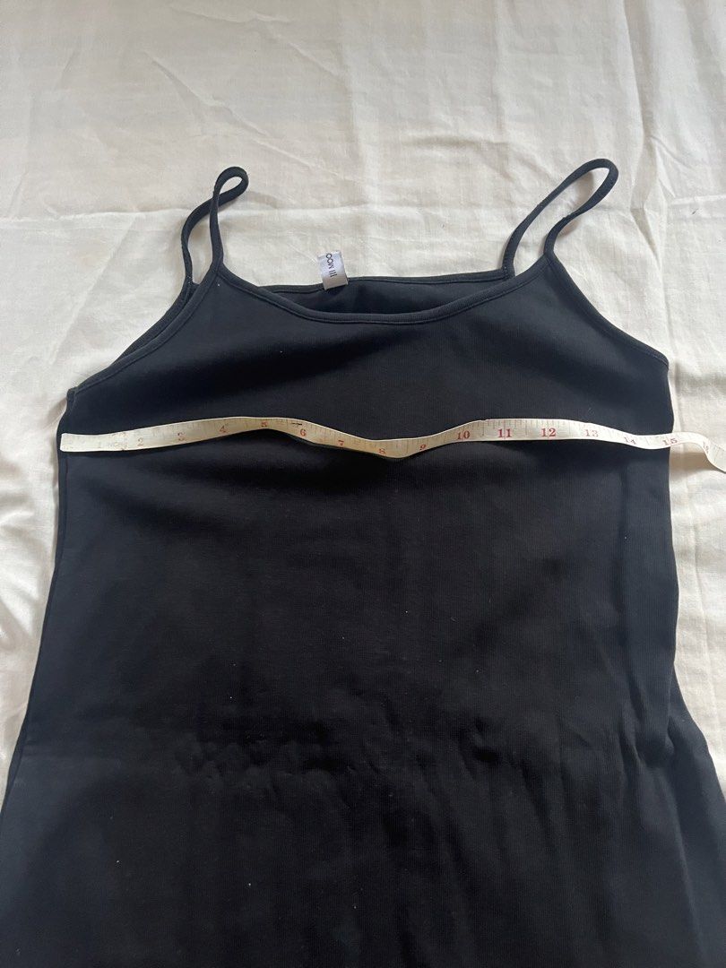 Black Spaghetti Strap Mini Dress (Category: Dresses) located in Pamplona. Submitted by vjbordon (Listing ID 1450848927, Image 2). Description: Basic black spaghetti strap mini dress. Stretchy material. Great for layering or wearing on its own. Measures about 13 inches across the chest. Simple and versatile piece for your wardrobe..