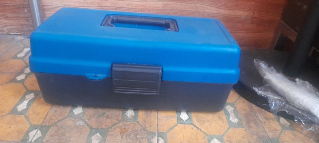 Blue and Black Plastic Toolbox with Tray Organizer (Category: Storage Boxes & Baskets) located in Valenzuela. Submitted by newbear.425b6e (Listing ID 1450813873, Image 1). Description: - Durable blue and black plastic toolbox - Features a secure latch for safe closure - Comes with a removable tray with compartments for organized storage - Ideal for small tools, craft supplies, or hardware - Approximately 6 inches tall -surplus .