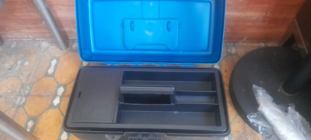 Blue and Black Plastic Toolbox with Tray Organizer (Category: Storage Boxes & Baskets) located in Valenzuela. Submitted by newbear.425b6e (Listing ID 1450813873, Image 2). Description: - Durable blue and black plastic toolbox - Features a secure latch for safe closure - Comes with a removable tray with compartments for organized storage - Ideal for small tools, craft supplies, or hardware - Approximately 6 inches tall -surplus .