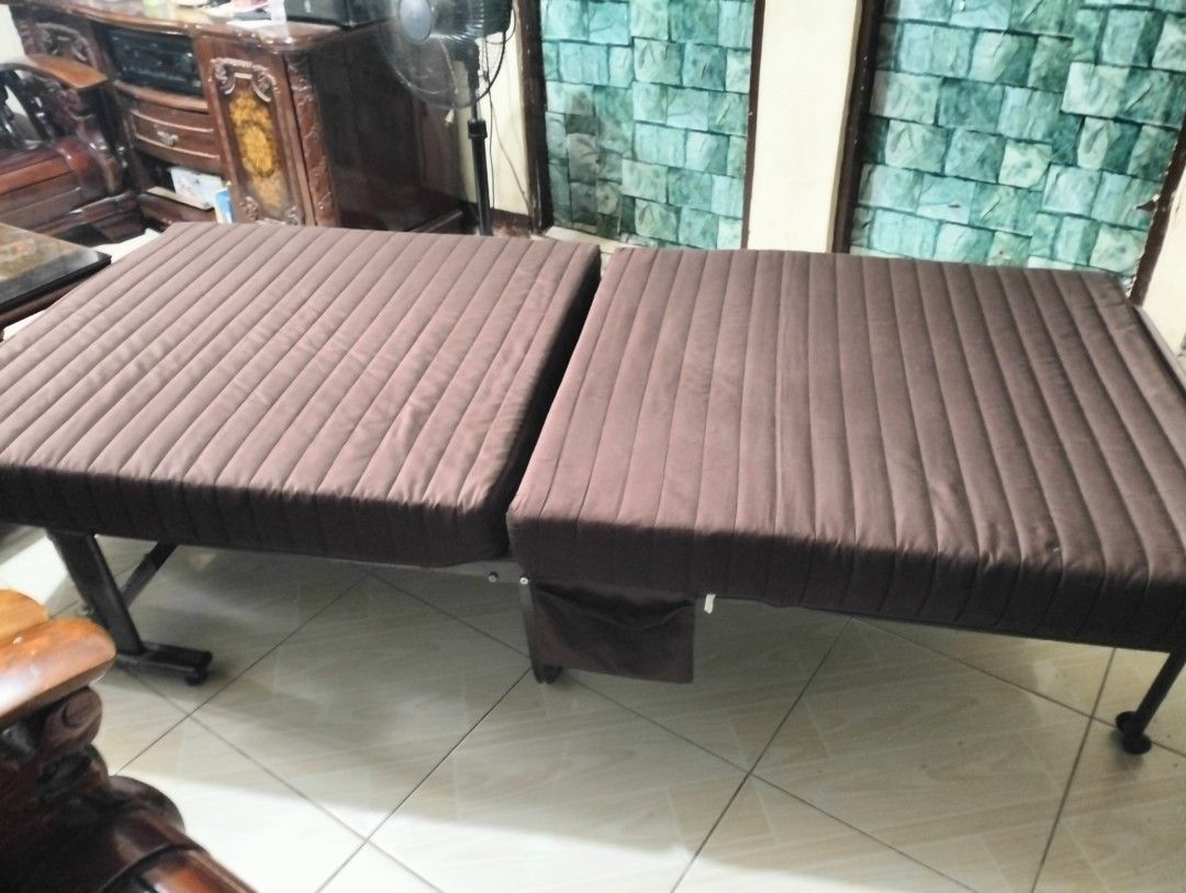 Japan Folding Bed with Mattress (Category: Bed Frames & Mattresses) located in Santa Rosa. Submitted by wawawiwao (Listing ID 1450769485, Image 2). Description: - Brown folding bed - Comfortable mattress with ribbed design - Folds up for easy storage - Metal frame - Wheels for easy mobility - Ideal for guests or small living spaces - Can also recline Loc : Santa Rosa Laguna.