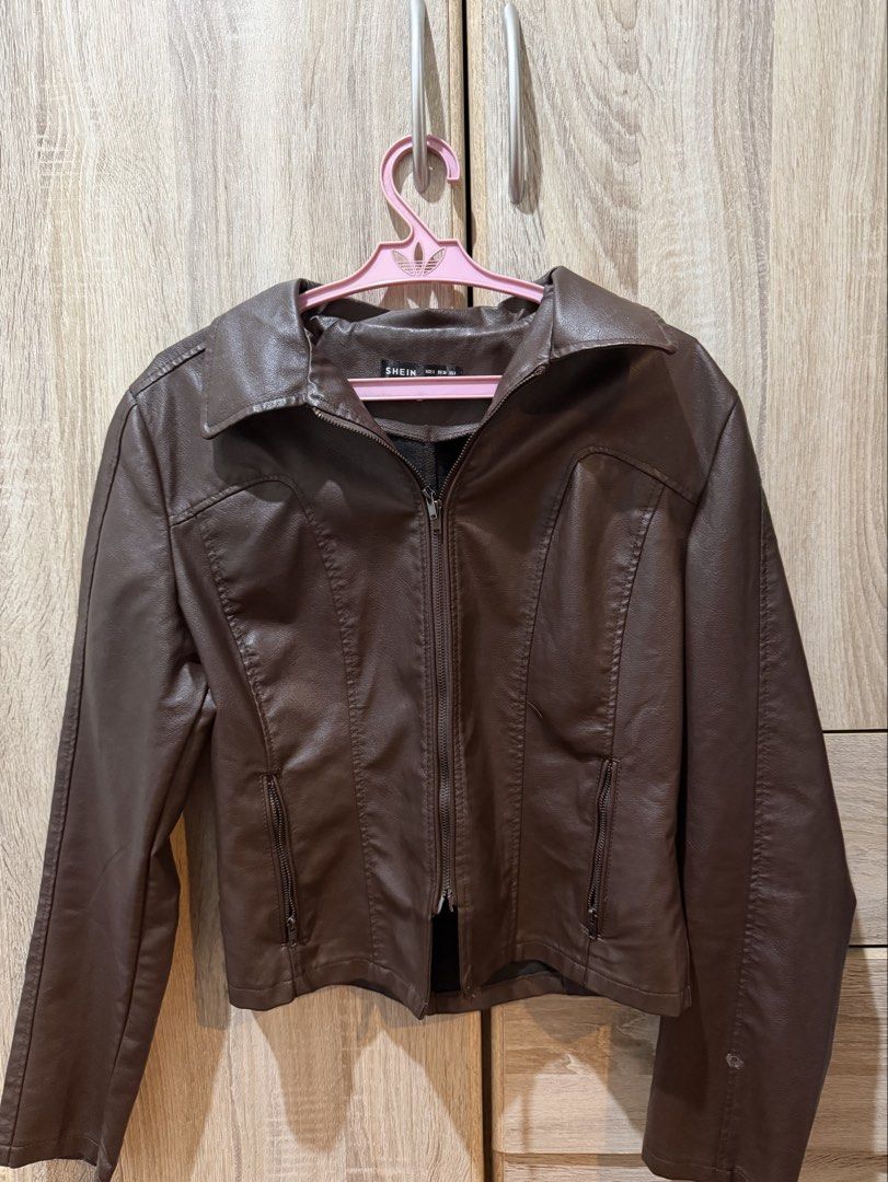 Brown leather jacket (Category: Coats, Jackets and Outerwear) located in Quezon City. Submitted by gem_210 (Listing ID 1450758590, Image 1). Description: > Used around 3x > Size: Small > DM for more pictures > Bought for 1k ~ > Last price! .