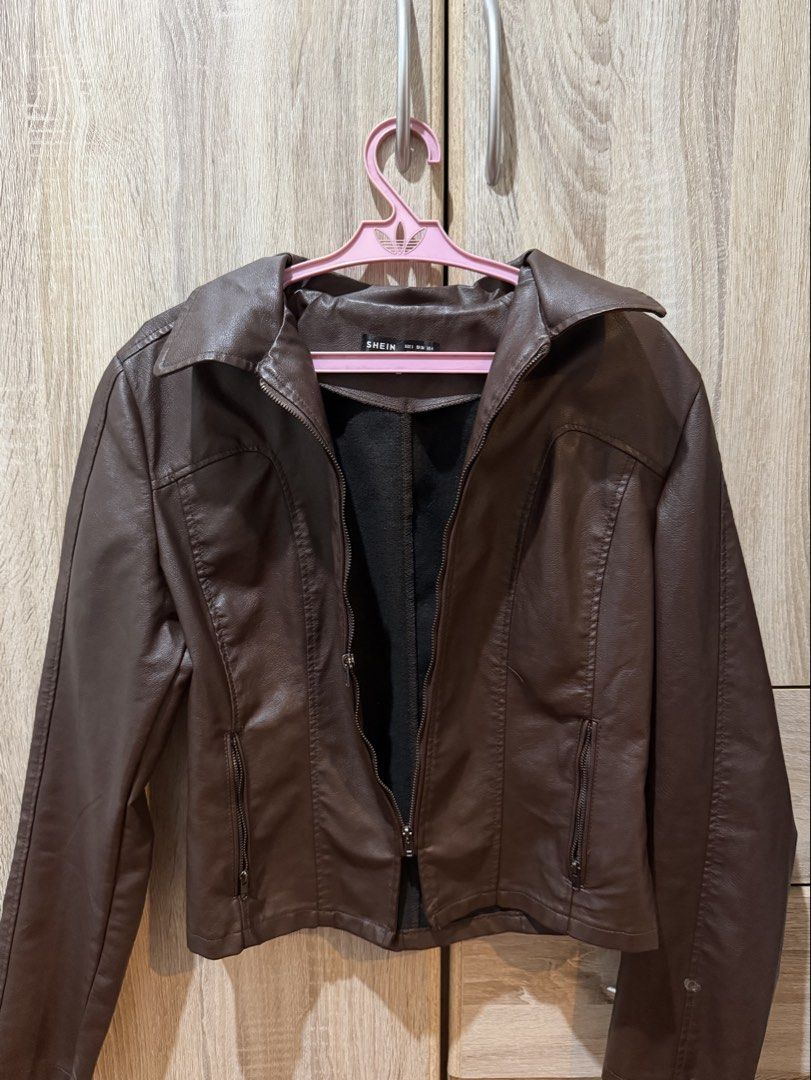 Brown leather jacket (Category: Coats, Jackets and Outerwear) located in Quezon City. Submitted by gem_210 (Listing ID 1450758590, Image 3). Description: > Used around 3x > Size: Small > DM for more pictures > Bought for 1k ~ > Last price! .