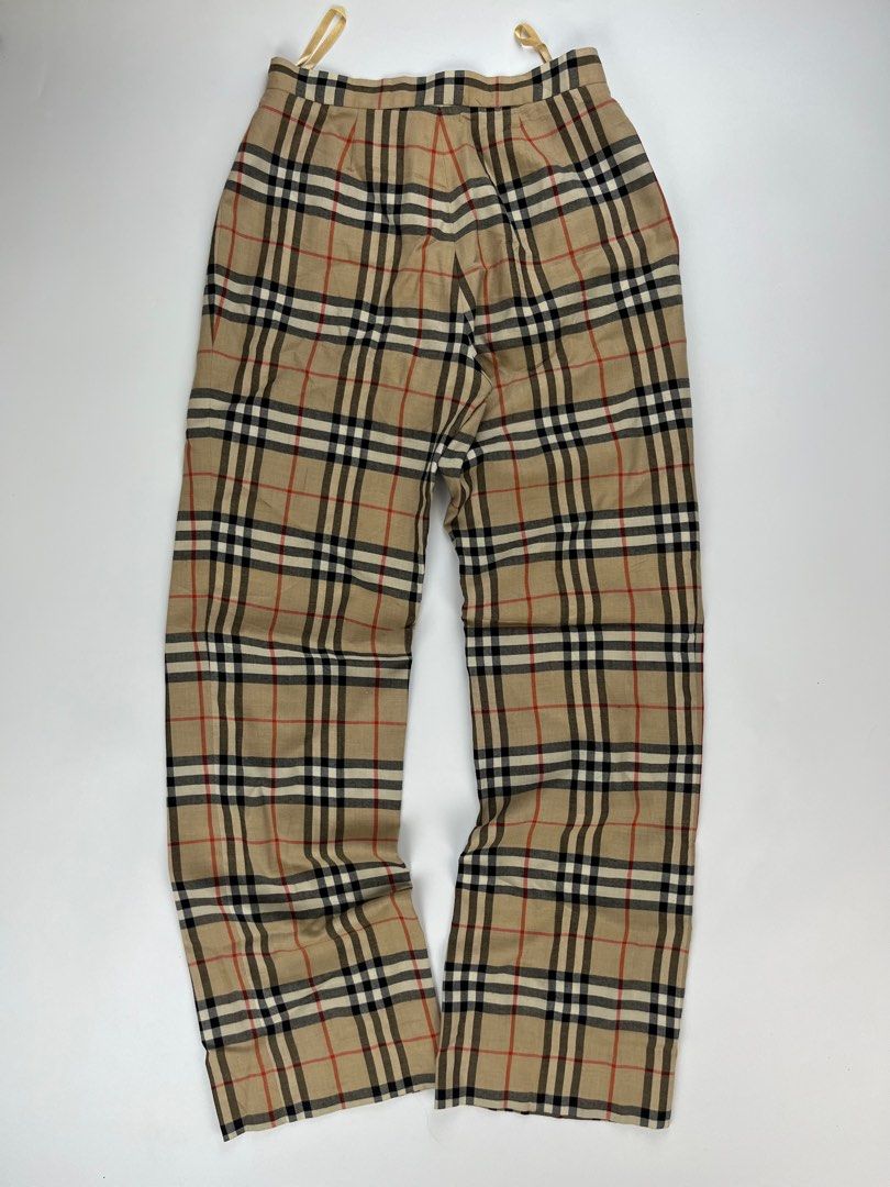 Burberry London Nova Check Wool Pants Size 6 (Category: Other Bottoms) located in Iloilo. Submitted by anonymous_ph (Listing ID 1450766002, Image 2). Description: - Authentic Burberry London Nova Check pants - Made from a comfortable wool blend - Features the iconic Burberry Nova Check pattern - Elasticated waistband with adjustable drawstring for a perfect fit - Classic straight leg cut - Elevate your style with these statement trousers -WAISTLI
