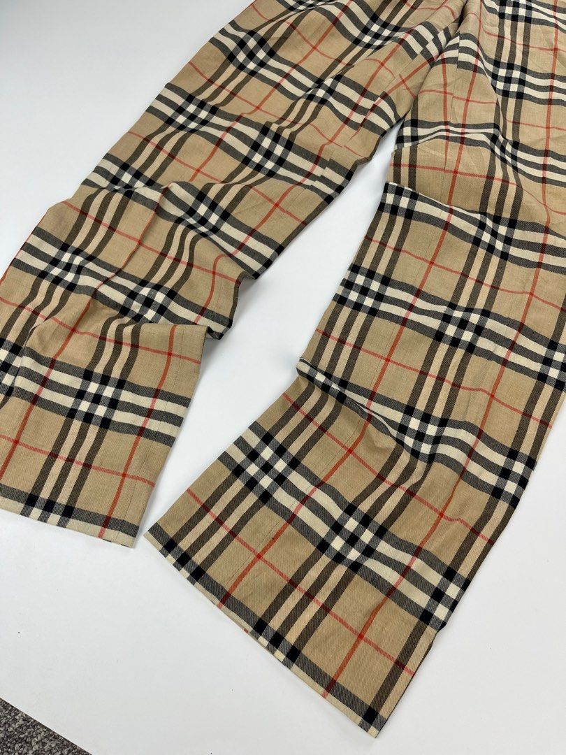 Burberry London Nova Check Wool Pants Size 6 (Category: Other Bottoms) located in Iloilo. Submitted by anonymous_ph (Listing ID 1450766002, Image 3). Description: - Authentic Burberry London Nova Check pants - Made from a comfortable wool blend - Features the iconic Burberry Nova Check pattern - Elasticated waistband with adjustable drawstring for a perfect fit - Classic straight leg cut - Elevate your style with these statement trousers -WAISTLI
