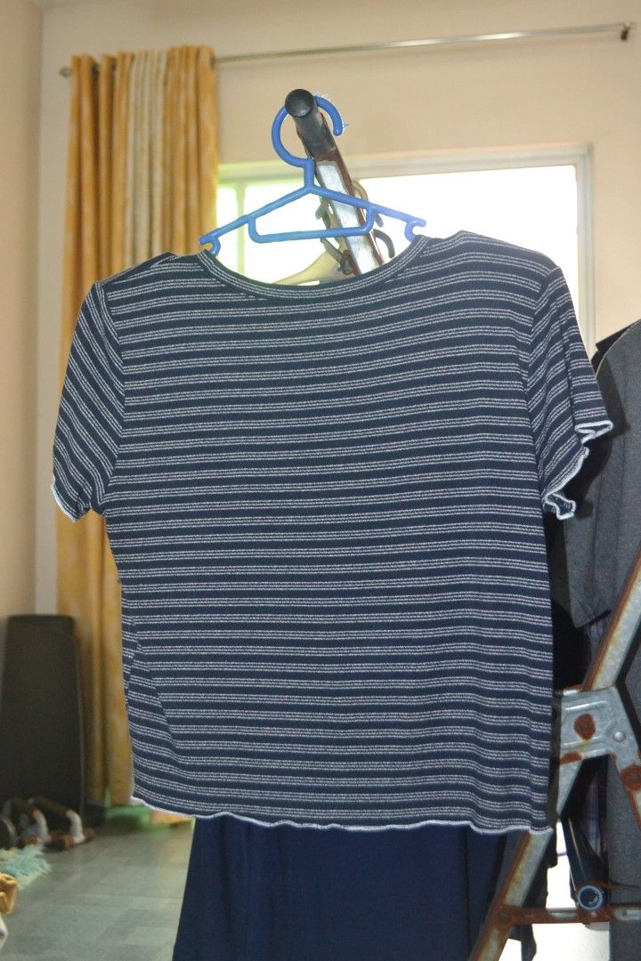 By Forever Striped Cropped T-shirt (Category: Shirts) located in Valenzuela. Submitted by miss_merix (Listing ID 1450809873, Image 2). Description: - Navy and white striped cropped t-shirt - Brand: By Forever - Features lettuce hem on sleeves and bottom - Estimated size: Medium (M) - Ideal for casual wear.