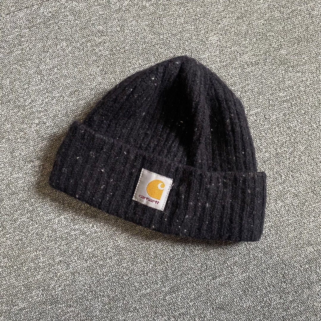 Carhartt Beanie Hat - One Size Fits All (Category: Caps & Hats) located in Tagum. Submitted by staysultry (Listing ID 1450822141, Image 1). Description: - Dark grey Carhartt beanie - Speckled with white and yellow flecks - Ribbed knit texture - Classic Carhartt logo patch on front - Made from a comfortable wool and cotton blend - Perfect for keeping warm in cooler weather.