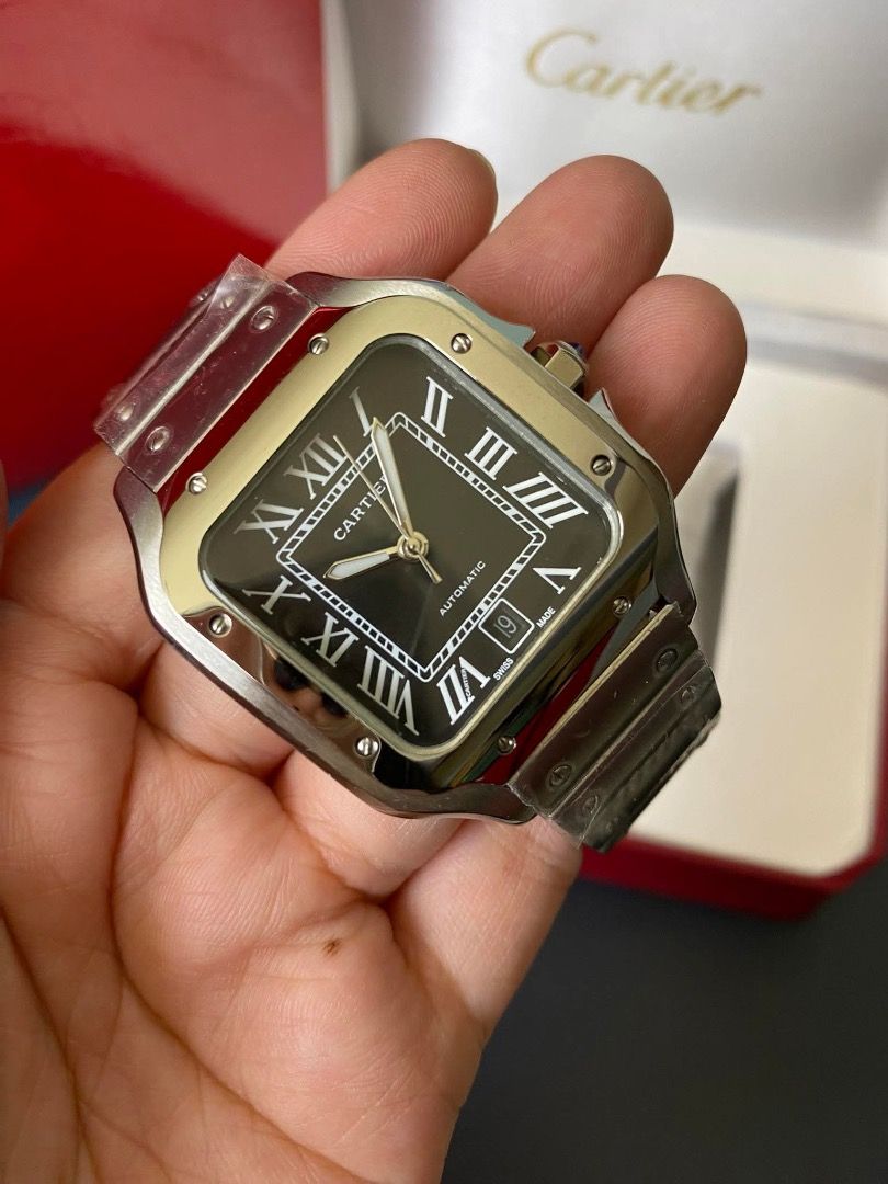 Cartier Santos (Category: Luxury Watches) located in Caloocan City. Submitted by mrbigdreams (Listing ID 1450755034, Image 2). Description: This is a stainless steel Cartier Santos de Cartier automatic watch featuring a signature square case with exposed screws on the bezel and a silvered opaline dial..