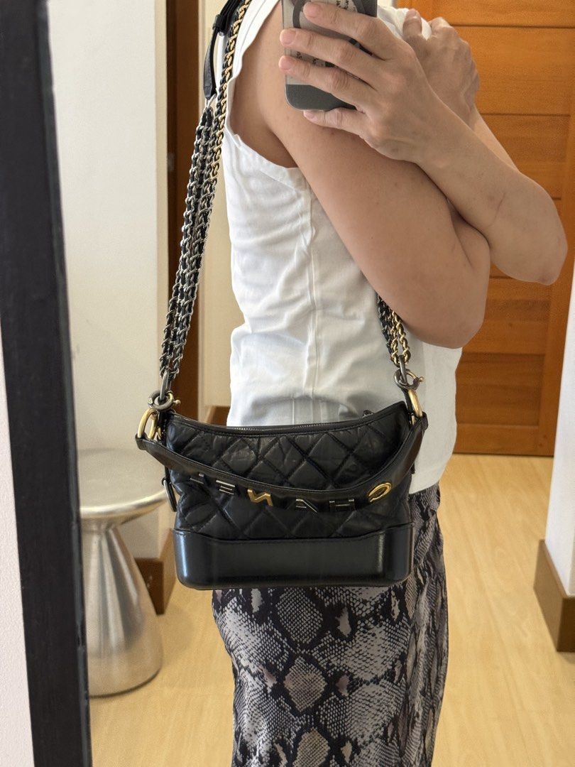 Chanel Gabrielle Hobo Bag Small Special Ed. (Category: Luxury Bags & Wallets) located in Taguig. Submitted by milchlee (Listing ID 1450812779, Image 1). Description: - Authentic Chanel - Mix of Silver, Gold, Ruthenium Chain Hardware - Iconic Chanel Logo and Lettering on Strap - Includes Original Chanel Dust Bag and Card .