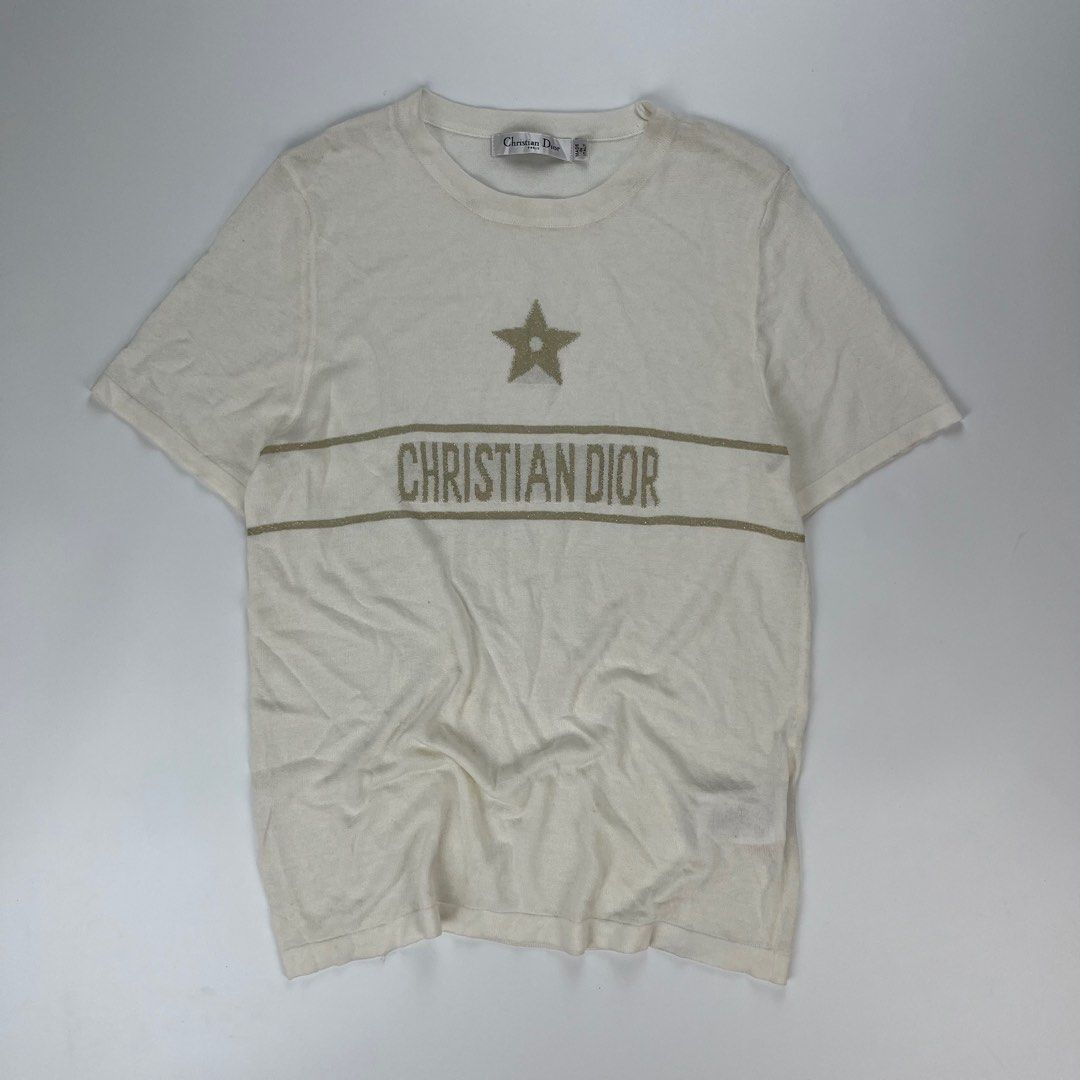 Christian Dior White Star Logo KNITTED (Category: Tshirts & Polo Shirts ) located in Iloilo. Submitted by anonymous_ph (Listing ID 1450767798, Image 1). Description: - Authentic Christian Dior T-Shirt - Size: 6 US - Color: White - Design: Features iconic star and logo detail - Material: Luxurious blend of Linen, Cashmere, Silk, Polyamide, and Lycra - Origin: Made in Italy - Condition: Great piece for any Dior fan (OPEN SIZE) -WIDTH 16.5 -LENGTH 2