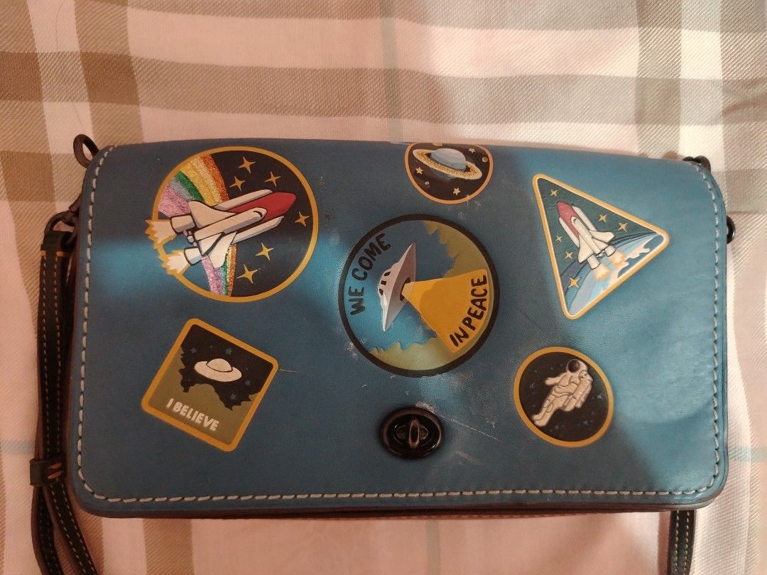 COACH limited edition Space DINKY Sling Bag (Category: Luxury Bags & Wallets) located in Guimba. Submitted by zai_1313 (Listing ID 1450839039, Image 3). Description: -Authentic Collector's item COACH 1941 x NASA Limited Edition Dinky Bag -Turquoise blue -Lowest Price -Good Condition - Comes with the original price tag - COD/COP thru LBC.