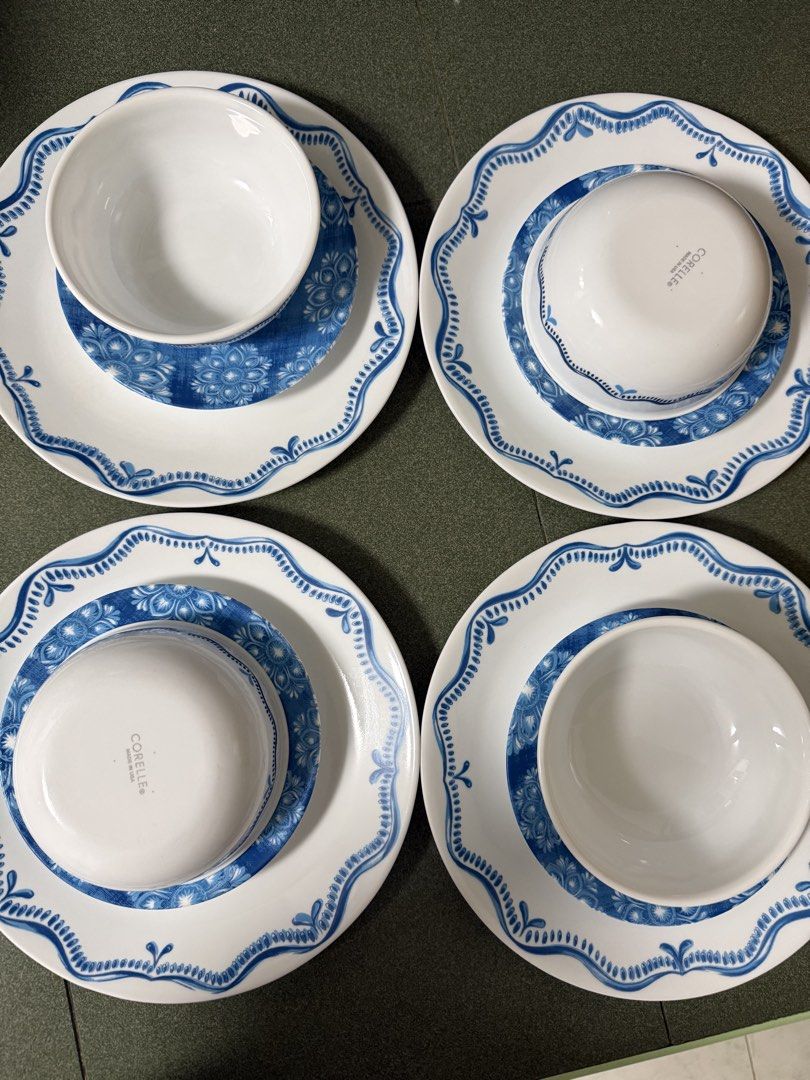 Corelle Blue Floral Dinnerware Set - 4 Plates & 4 Bowls (Category: Dinnerware & Cutlery) located in Limay. Submitted by jnl05 (Listing ID 1450866464, Image 1). Description: - Corelle Plate Set of 4(12pcs) -Set includes 4 Corelle plates and 4 bowls 4mini plates - Features a beautiful blue floral pattern on plates and blue trim on bowls. - Made in the USA. - Ideal for everyday dining and special occasions. - Dishwasher and microwave safe for conven
