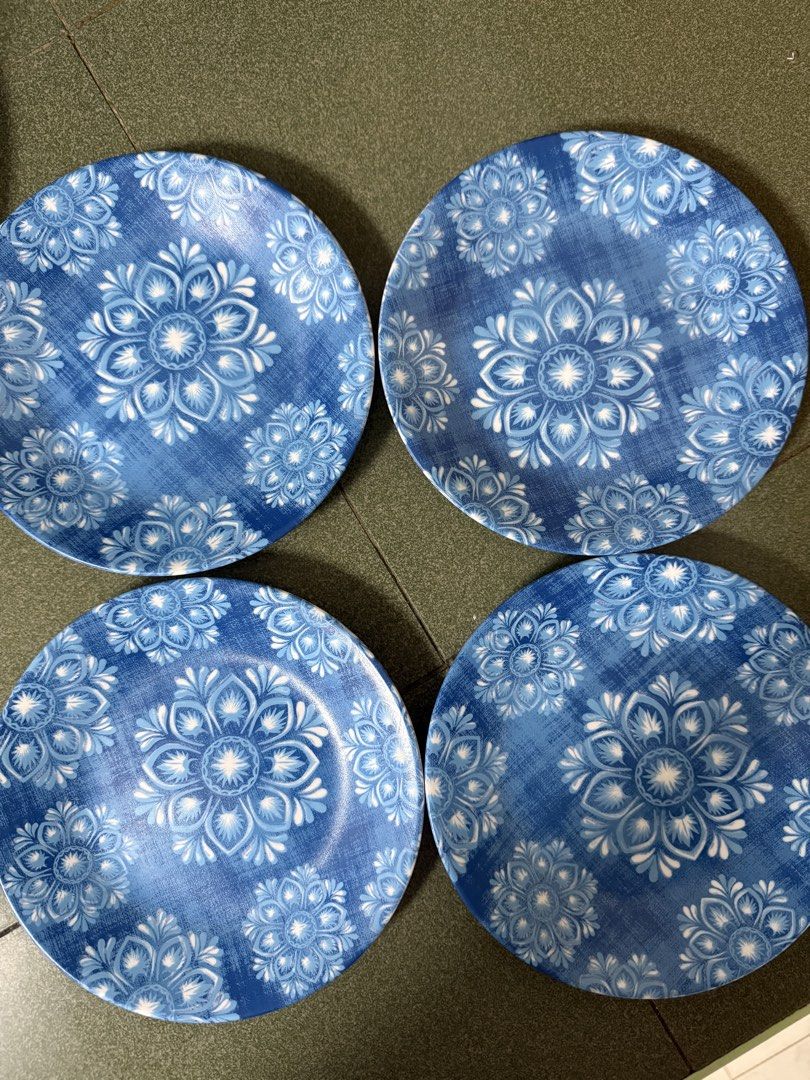 Corelle Blue Floral Dinnerware Set - 4 Plates & 4 Bowls (Category: Dinnerware & Cutlery) located in Limay. Submitted by jnl05 (Listing ID 1450866464, Image 2). Description: - Corelle Plate Set of 4(12pcs) -Set includes 4 Corelle plates and 4 bowls 4mini plates - Features a beautiful blue floral pattern on plates and blue trim on bowls. - Made in the USA. - Ideal for everyday dining and special occasions. - Dishwasher and microwave safe for conven