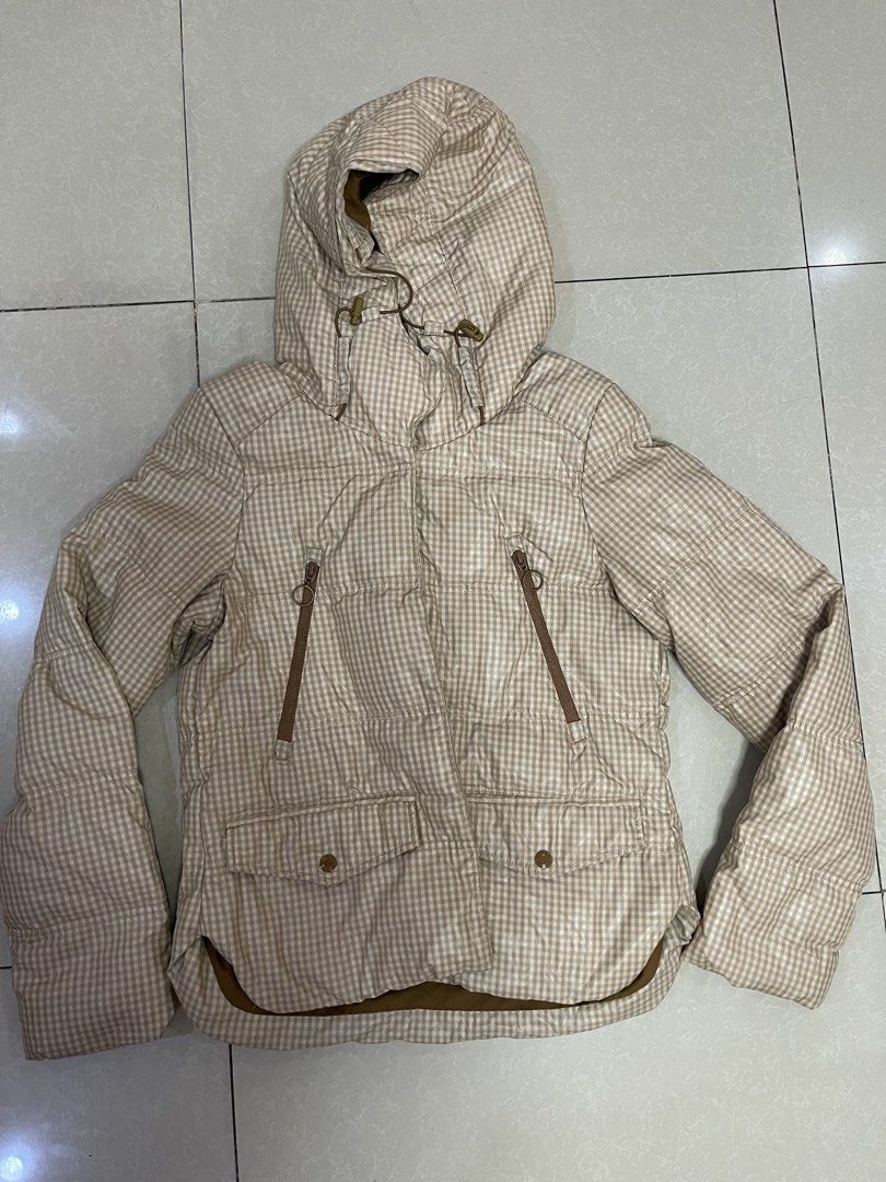 Cream Checkered Puffer Jacket with Hood (Category: Coats, Jackets and Outerwear) located in Manila. Submitted by offtherack_mnl (Listing ID 1450756013, Image 1). Description: - Stylish checkered puffer jacket - Attached hood with drawstrings - Two chest zip pockets - Two front flap pockets - Excellent for warmth and comfort - Unique and eye-catching pattern .