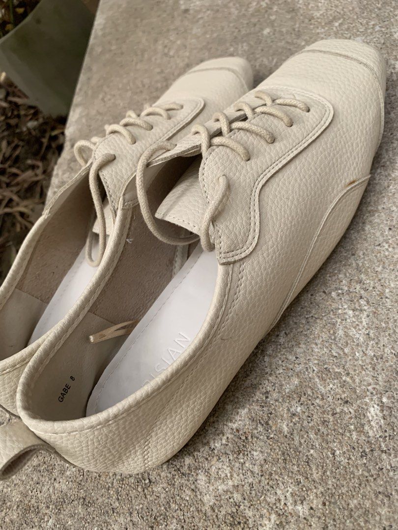 Cream Lace-up leather shoes (Category: Sneakers) located in Marikina City. Submitted by projectsparkjoy (Listing ID 1450738757, Image 3). Description: Brand: Parisian Color: Cream Material: PU leather Size: 8 but sizing is a bit small. Would fit a size 7. Soft leather and insole Clean insole and soles No issues SF C/o buyer.