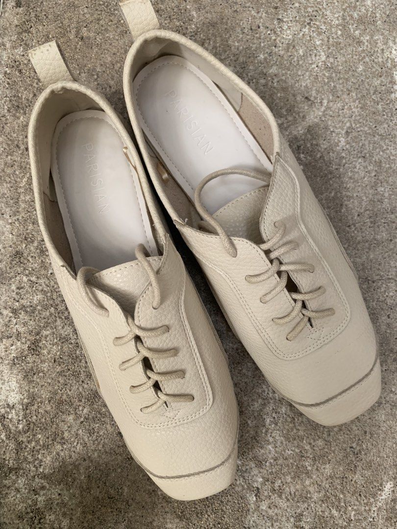 Cream Lace-up leather shoes (Category: Sneakers) located in Marikina City. Submitted by projectsparkjoy (Listing ID 1450738757, Image 2). Description: Brand: Parisian Color: Cream Material: PU leather Size: 8 but sizing is a bit small. Would fit a size 7. Soft leather and insole Clean insole and soles No issues SF C/o buyer.
