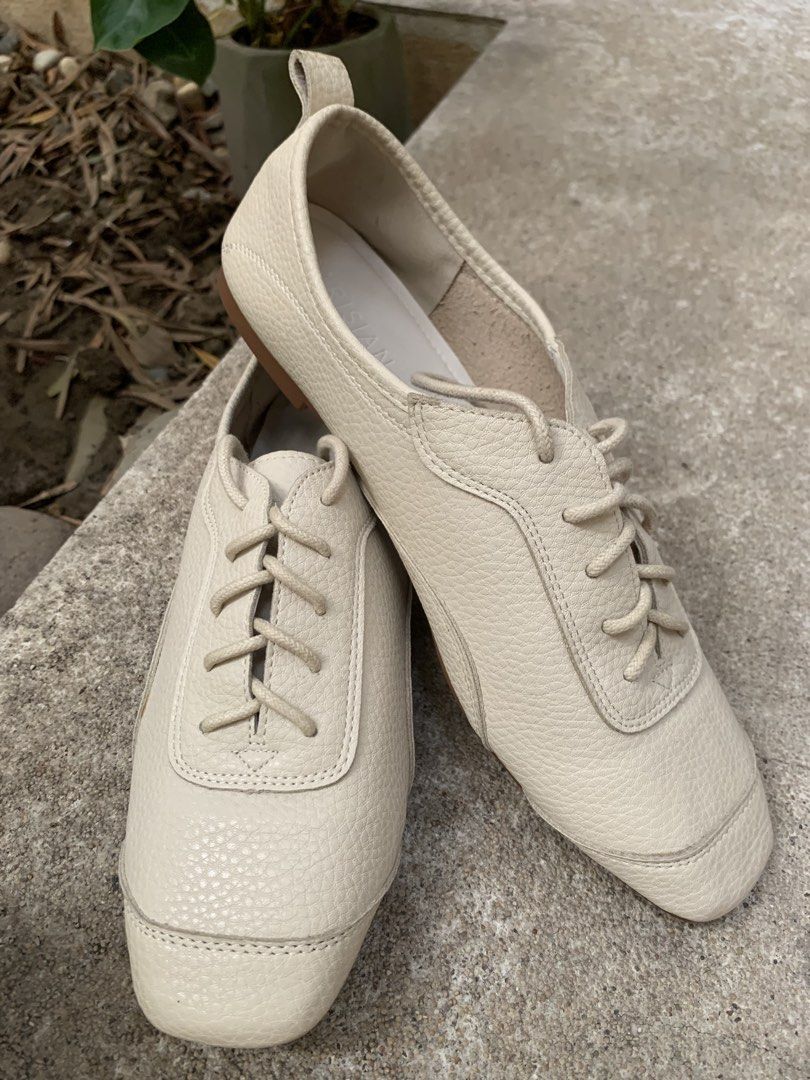 Cream Lace-up leather shoes (Category: Sneakers) located in Marikina City. Submitted by projectsparkjoy (Listing ID 1450738757, Image 1). Description: Brand: Parisian Color: Cream Material: PU leather Size: 8 but sizing is a bit small. Would fit a size 7. Soft leather and insole Clean insole and soles No issues SF C/o buyer.