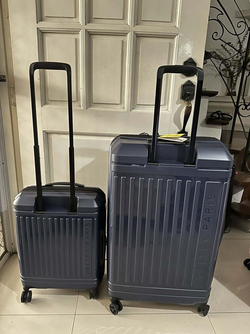Delsey Paris Luggage Set - Navy Blue (Category: Luggage) located in Pasig City. Submitted by ageless_29 (Listing ID 1450858073, Image 2). Description: Can buy as set or per piece: Dark Blue Set: Orig: 33,980 Sale: 21,000 If per piece: Large: 14,000 Handcarry: 8,000 - Set of 2 Delsey Paris suitcases - Color: Deep Navy Blue - Sizes: 1 Carry-on, 1 Large Checked - Features: Ribbed exterior, Spinner wheels for easy maneuverability, Telescoping handles