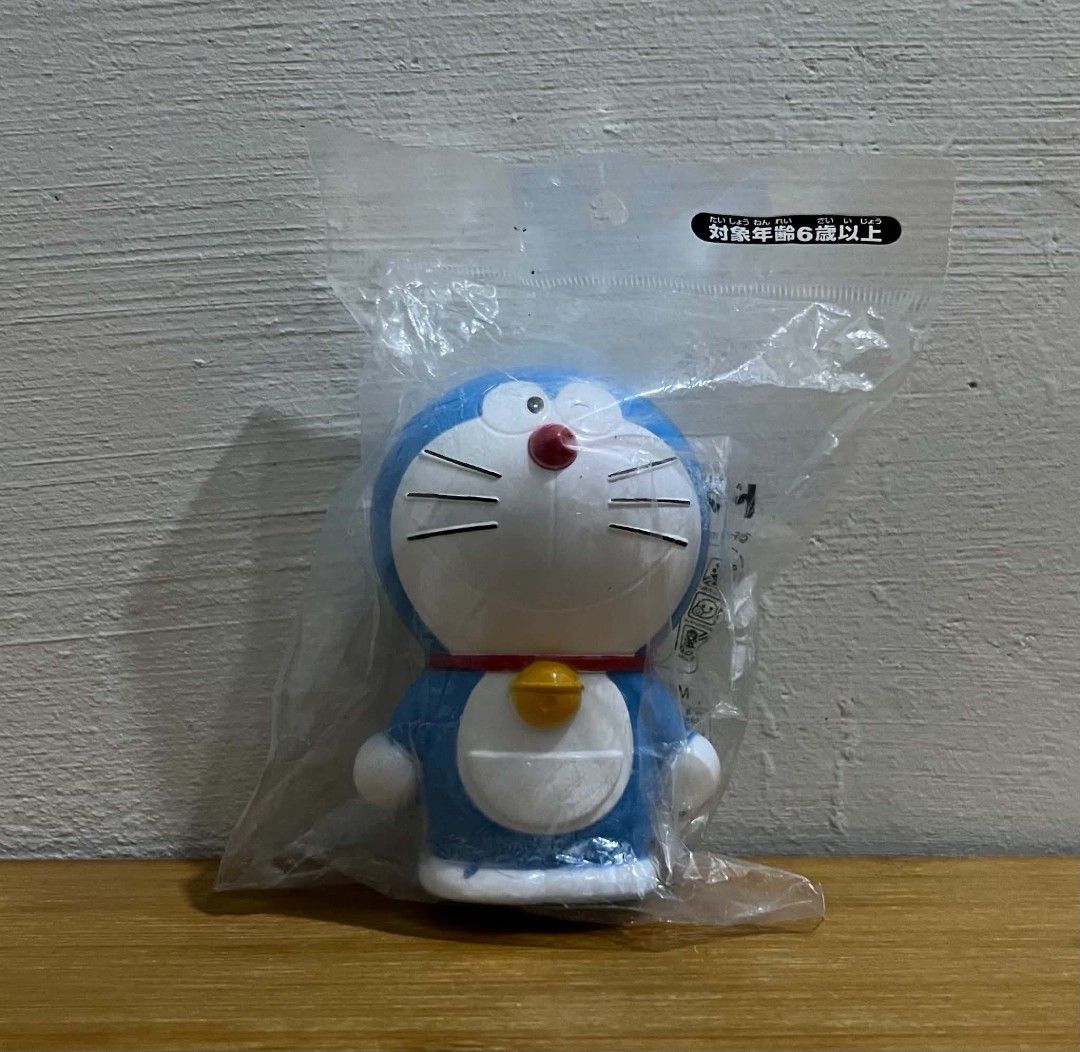 DORAEMON COIN BANK FIGURE (Category: Vintage Collectibles) located in Villasis. Submitted by aalvar.collection (Listing ID 1450881066, Image 1). Description: Selling Doraemon Coin Bank Figure for Php200 only. -wyswyg -MIP condition (Sealed) -issue: even thou sealed, visible paint chip at foot -with markings Mop: Gcash Mod: Meetup, J&T or LBC (COP/COD) My Location: Villasis, Pangasinan Shipping: Open for shipping, Buyers will handle the expense No