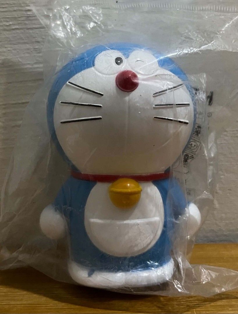 DORAEMON COIN BANK FIGURE (Category: Vintage Collectibles) located in Villasis. Submitted by aalvar.collection (Listing ID 1450881066, Image 2). Description: Selling Doraemon Coin Bank Figure for Php200 only. -wyswyg -MIP condition (Sealed) -issue: even thou sealed, visible paint chip at foot -with markings Mop: Gcash Mod: Meetup, J&T or LBC (COP/COD) My Location: Villasis, Pangasinan Shipping: Open for shipping, Buyers will handle the expense No